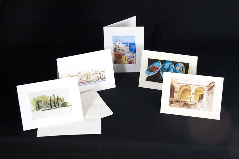 Greeting cards with Marion's paintings of towns and boats